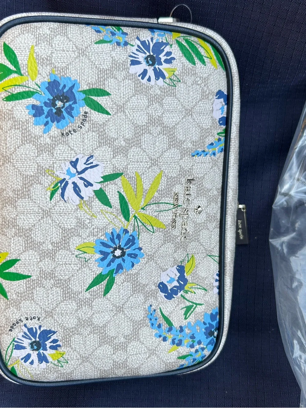 kate spade beige logo-lined handbag interior